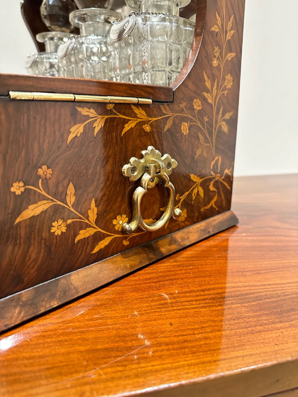 A Fine Quality Inlaid Walnut Three Decanter Tantalus & Games Box. View X