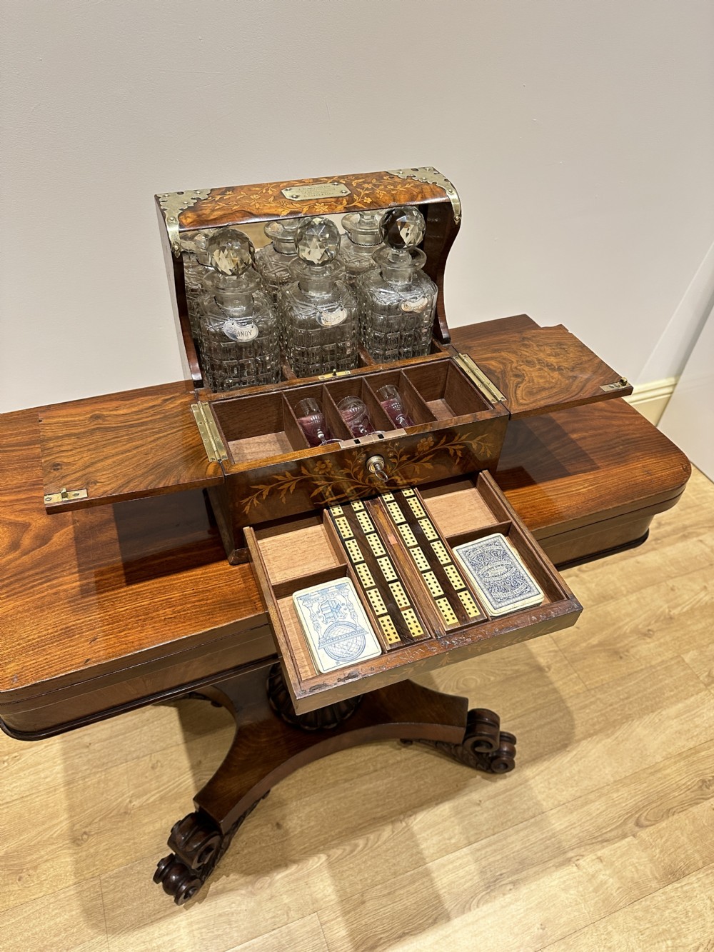 A Fine Quality Inlaid Walnut Three Decanter Tantalus & Games Box. View XI