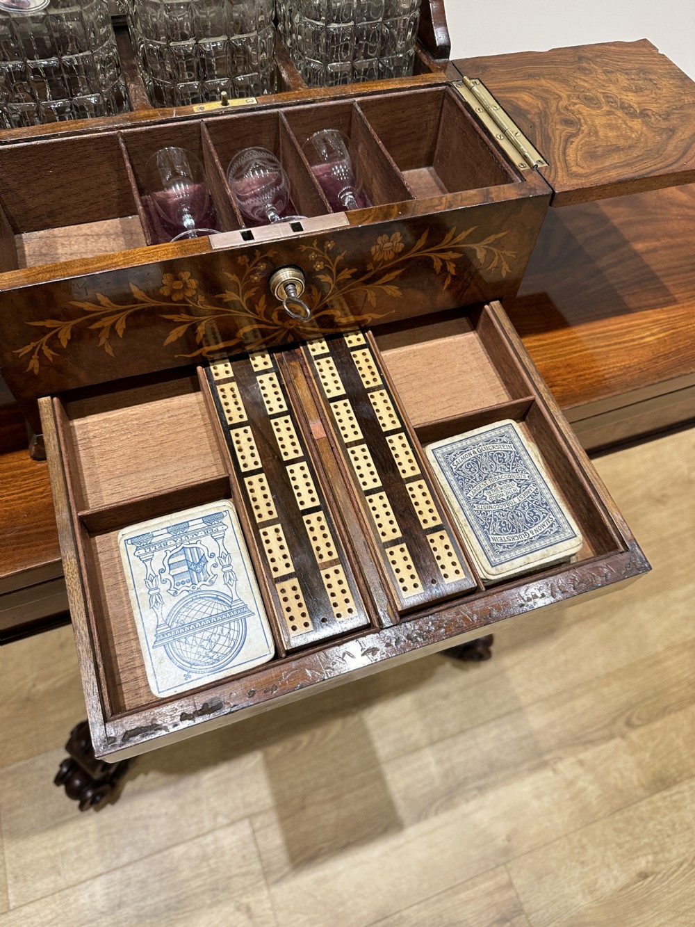 A Fine Quality Inlaid Walnut Three Decanter Tantalus & Games Box. View XII