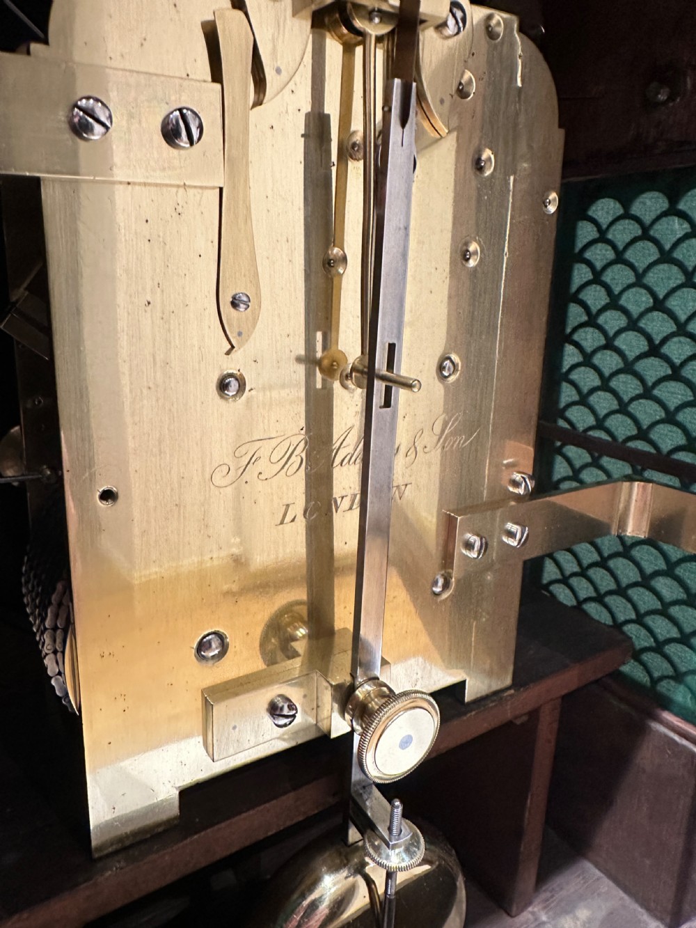 A Regency Bracket Clock By F B Adams Of London, With Wall Bracket. View IV