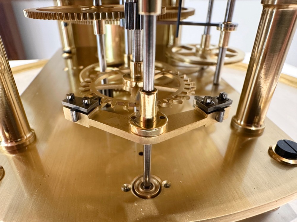 An Edwardian Lenzkirch precision regulator longcase clock housed in a dark walnut case featuring a silvered dial and glazed door revealing a brass pendulum. View VI
