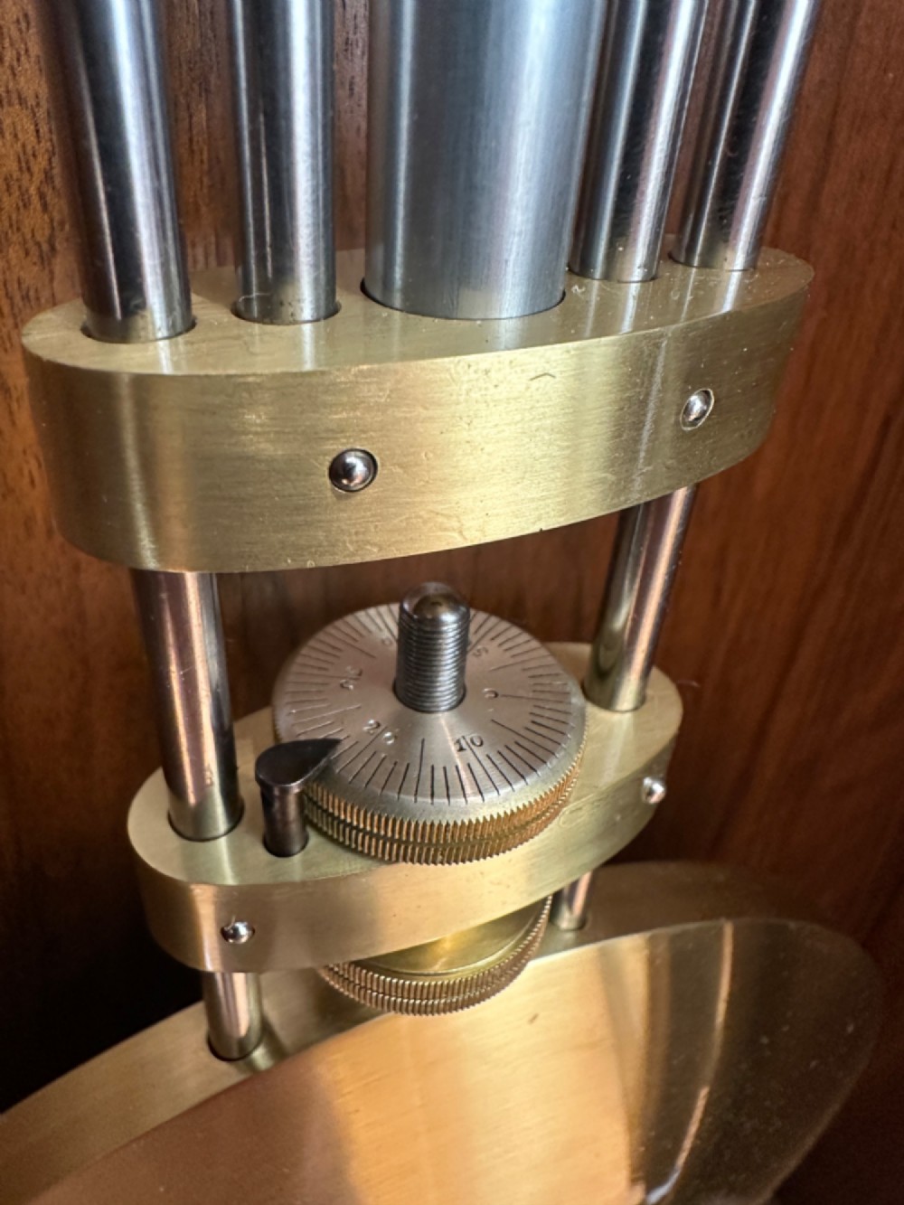 An Edwardian Lenzkirch precision regulator longcase clock housed in a dark walnut case featuring a silvered dial and glazed door revealing a brass pendulum. View XI