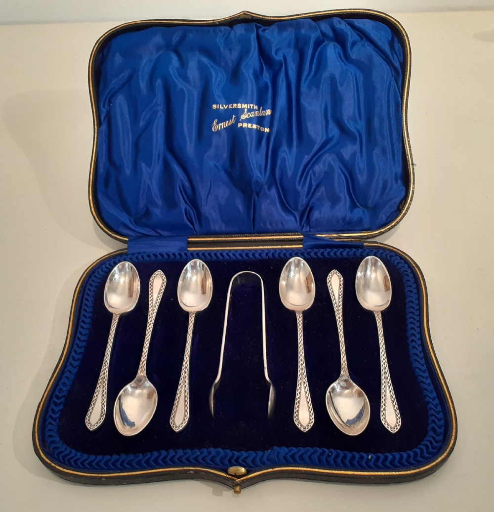 Six Silver Coffee Spoons and Sugar Tong, Sheffield 1911