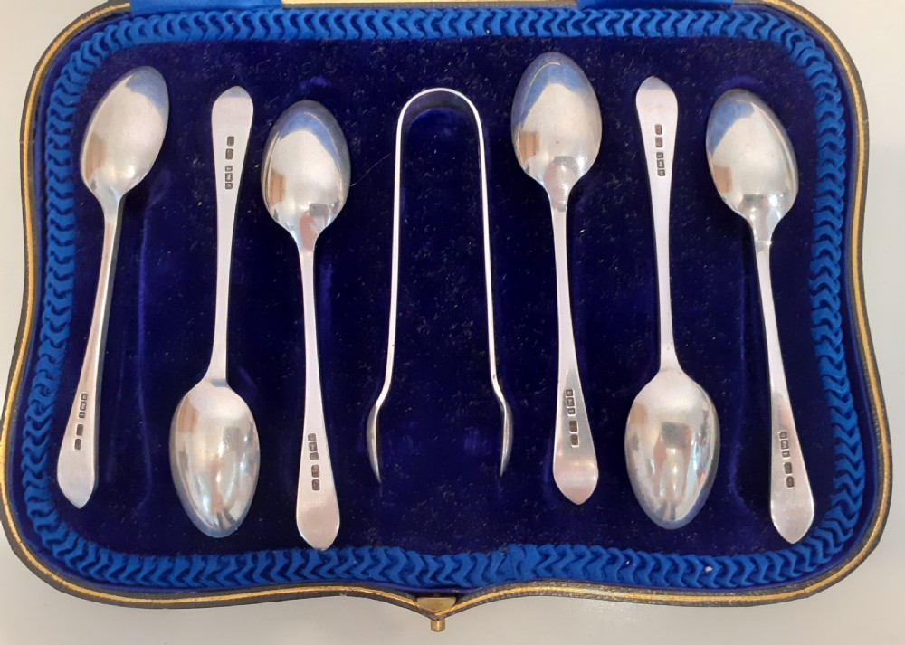 Six Silver Coffee Spoons and Sugar Tong, Sheffield 1911 View II