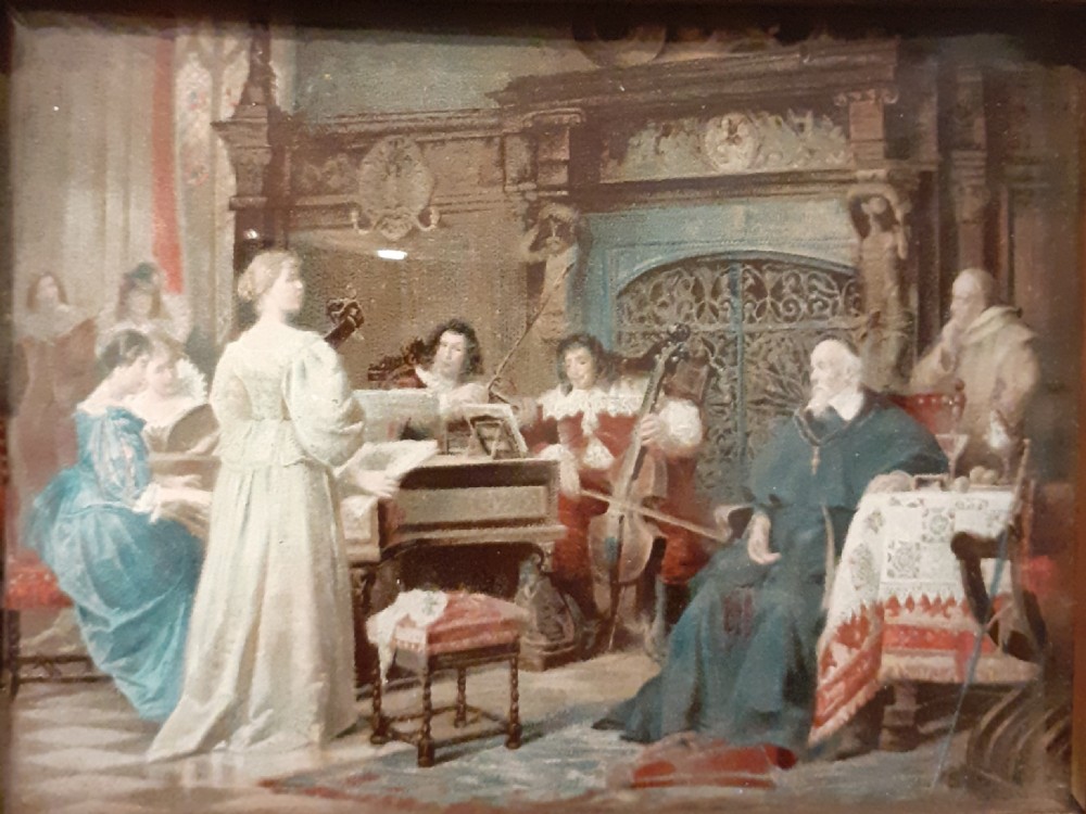 An early 20th-century framed Limoges enamel plaque depicting a musical salon scene, housed in a polished brown timber frame with a beaded inner border. View II