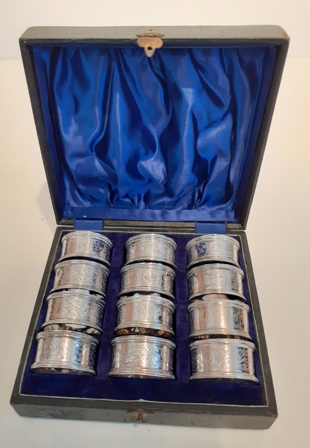 Twelve Edwardian Silver and Silver Plated Napkin Rings