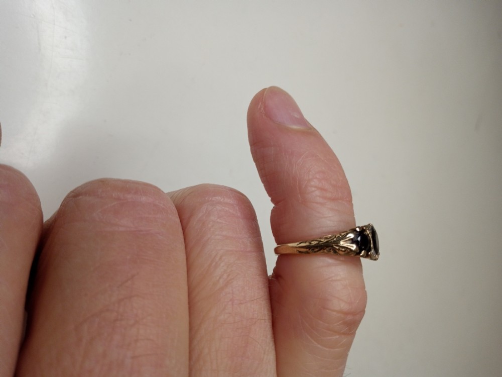 Nine Carat Gold Ring with Garnets and four small Diamonds View II