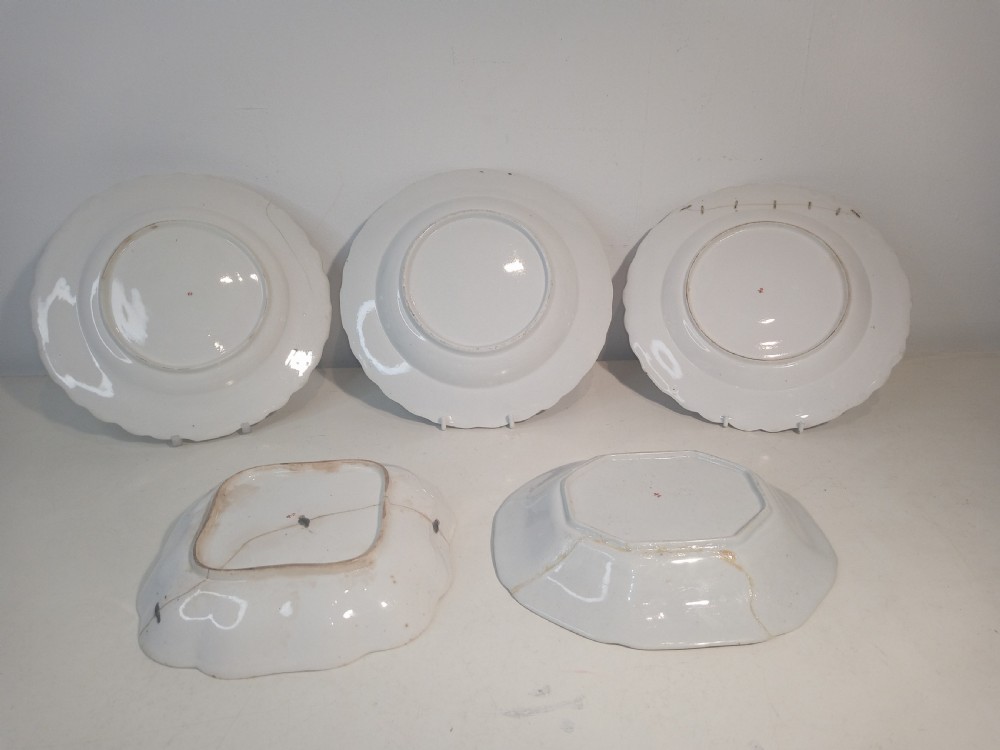 A set of five mid-18th-century Georgian Chelsea soft-paste porcelain plates and shallow bowls decorated with painted floral sprays and pink diaper borders. View III