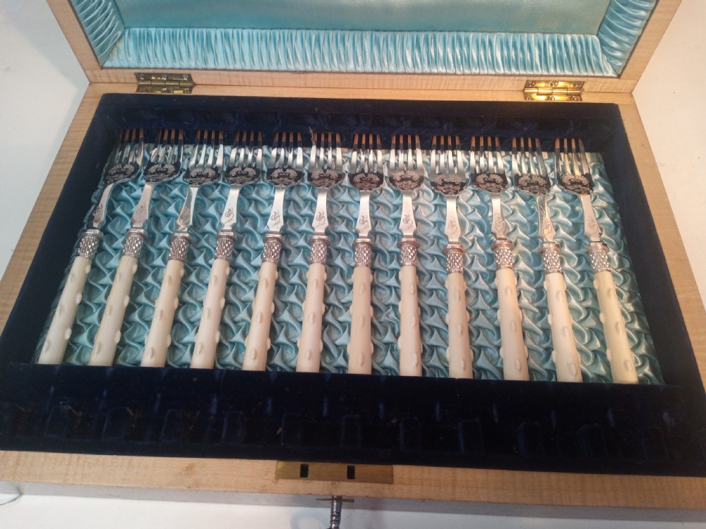 Twelve Piece Fish Fork and Knife Set View II