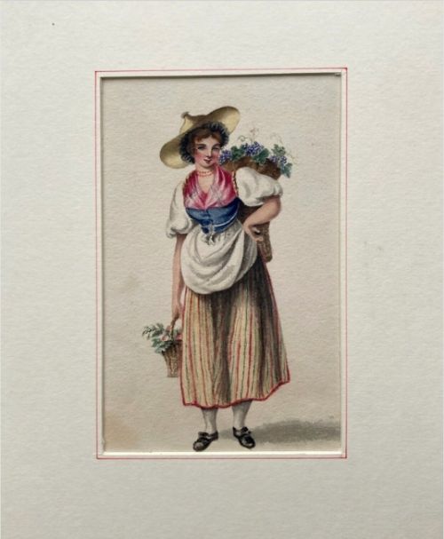 fig 1. An antique watercolour painting depicting a traditional Swiss woman in regional costume carrying baskets of grapes.