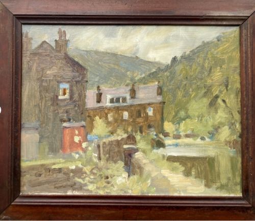 fig 1. A mid-20th-century oil painting on board depicting stone houses nestled beside water and green hills, framed in a wide brown timber moulding.