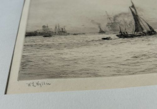 A monochrome etching depicting sailing barges, steamships, and tugboats on the River Thames at Blackwall Reach, pencil-signed by artist William Lionel Wyllie in the lower left margin. View VI