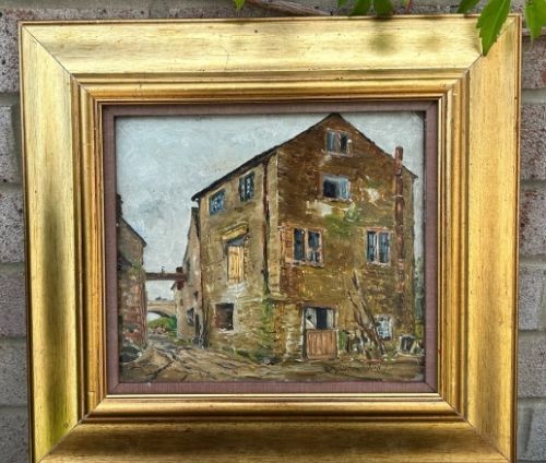 fig 2. An early twentieth-century oil painting on panel depicting a stone mill building, framed within a fabric slip and a moulded giltwood frame.