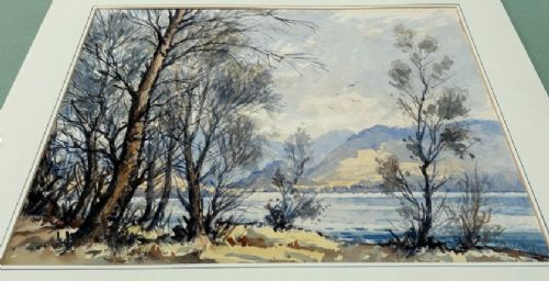 An original landscape watercolour painting depicting bare winter trees on a lake shoreline with distant Cumbrian mountains rendered in muted blue, grey, and brown tones. View IX