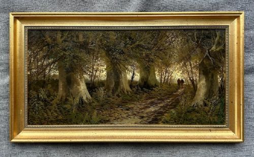 fig 2. A late 19th-century framed oil painting depicting two small figures walking along a wooded path surrounded by mature trees in an autumn landscape.