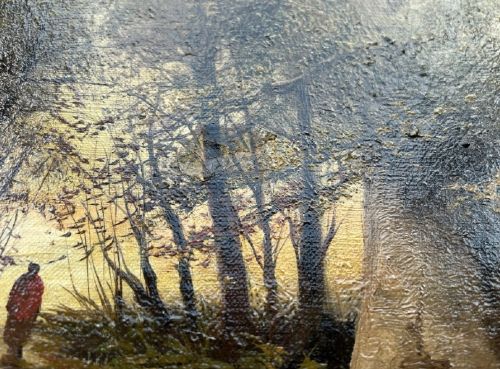 A late nineteenth-century horizontal oil painting depicting a solitary figure walking along a sunlit woodland path framed by large ancient trees within a gold leaf frame. View VII