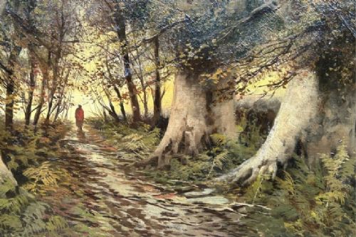 A late nineteenth-century horizontal oil painting depicting a solitary figure walking along a sunlit woodland path framed by large ancient trees within a gold leaf frame. View X