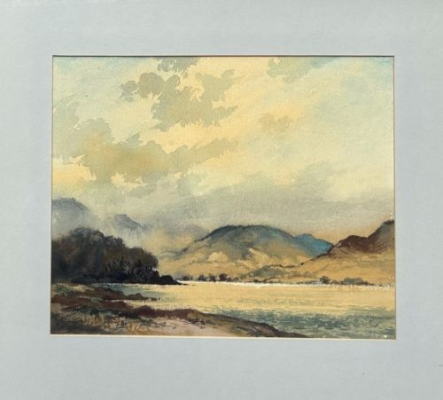 fig 3. A mid-20th-century watercolour painting depicting a lake surrounded by mountains under a soft clouded sky.