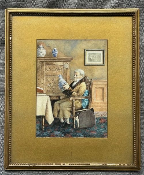 fig 2. A late 19th-century watercolour painting depicting an elderly gentleman seated in a carved oak chair, examining a blue and white porcelain vase inside a wood-panelled room.