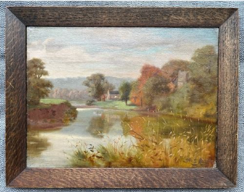 fig 3. A late 19th-century oil painting on canvas depicting a tranquil autumn river landscape framed in a wide, dark oak wood frame.