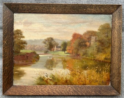A late 19th-century oil painting on canvas depicting a tranquil autumn river landscape framed in a wide, dark oak wood frame. View XI
