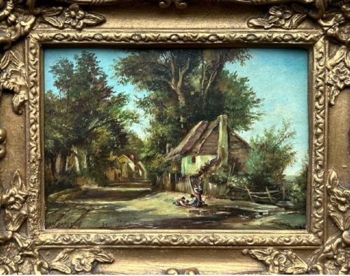 fig 2. An antique oil painting on panel depicting a rural British cottage surrounded by trees, set within an ornate gilt frame.