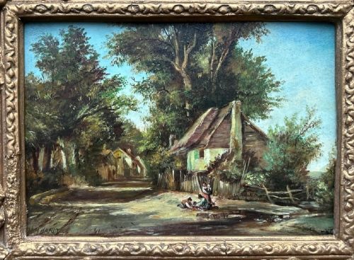 fig 3. An antique oil painting on panel depicting a rural British cottage surrounded by trees, set within an ornate gilt frame.