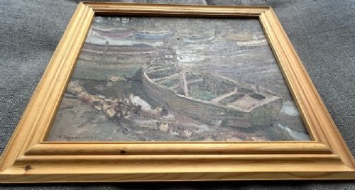 A mid-century oil painting on board depicting wooden barges and boats resting on a muddy riverbed at low tide. View VII