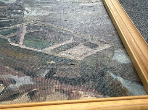 A mid-century oil painting on board depicting wooden barges and boats resting on a muddy riverbed at low tide. View IX