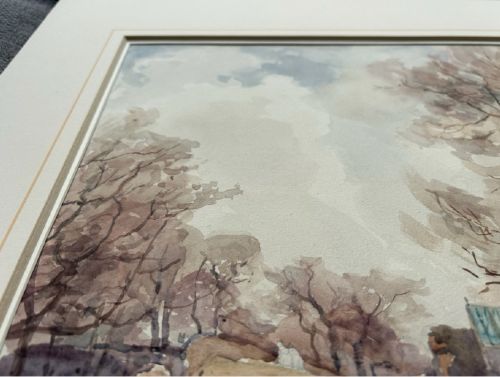 An early twentieth-century watercolour painting depicting a figure walking along a dirt lane towards a stone cottage under bare trees. View XI