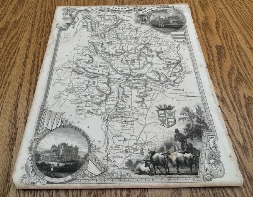 fig 1. A steel engraved monochrome map of Huntingdonshire by Thomas Moule dated circa 1840 with heraldic crests and topographical vignettes.