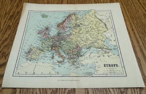 A late nineteenth-century printed colour political map of Europe on cream paper featuring defined national boundaries and surrounding ocean bodies. View III