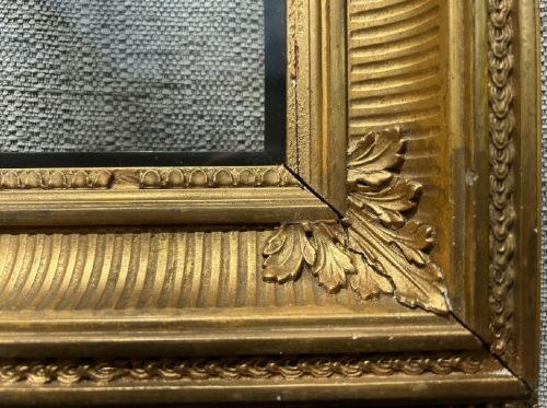 fig 3. An antique square giltwood picture frame featuring fluted hollow moulding, acanthus leaf corner ornaments, and beaded inner borders.