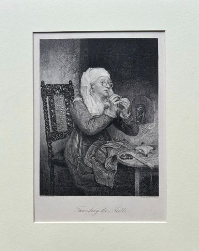 fig 1. A monochrome nineteenth-century steel engraving depicting an elderly woman wearing spectacles and a headscarf threading a needle while seated at a small wooden table.