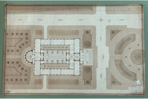 fig 1. A framed 1933 hand-drawn architectural site plan featuring a central rectangular museum layout flanked by symmetrical plazas and avenues rendered in sepia ink and wash.