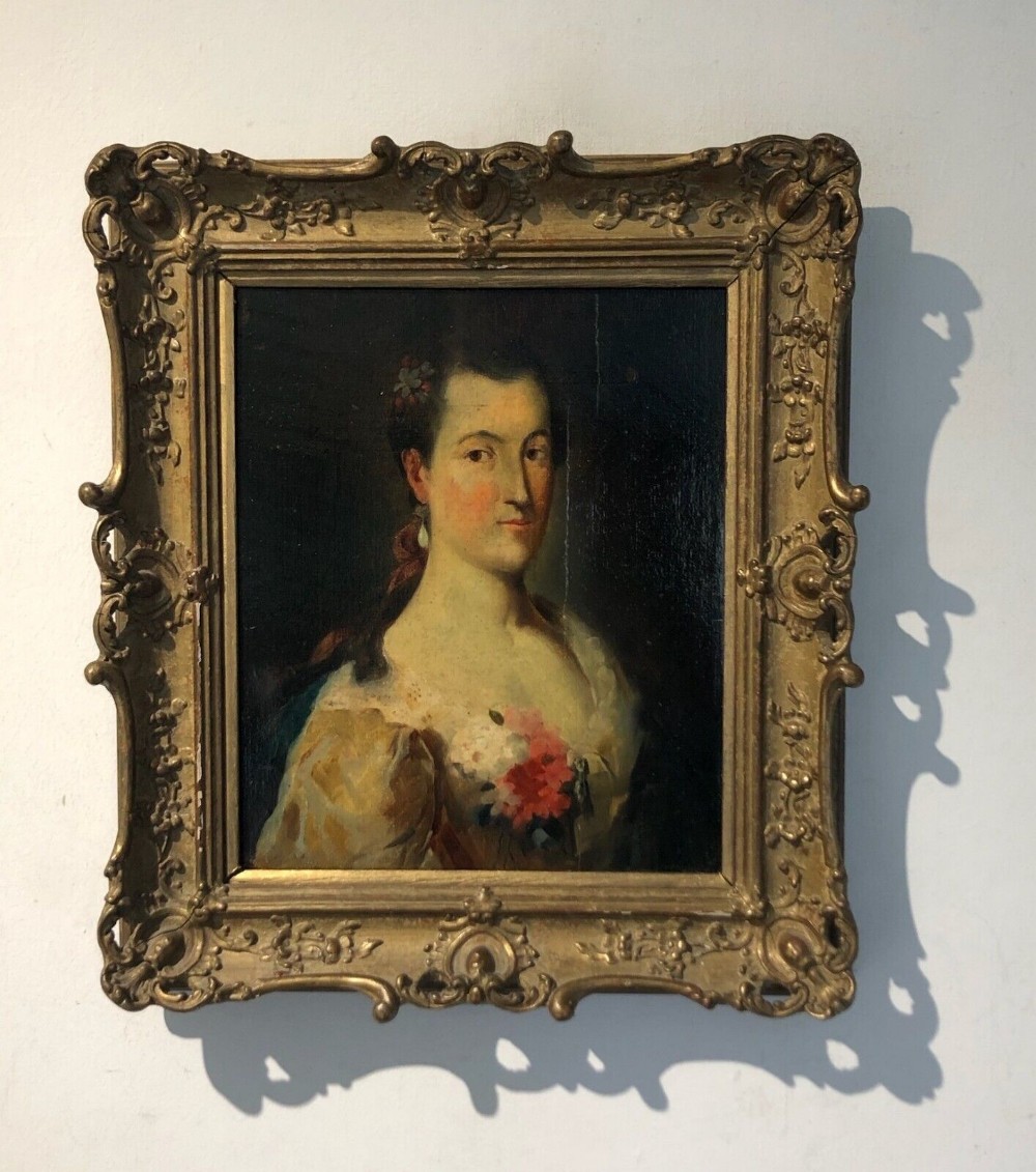 Original Early 19th Century European School Antique Oil Painting on canvas attached to Wood Panel Portrait of a Lady in a Lace trimmed Gown with Corsage
