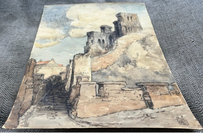 An early 20th-century watercolour painting depicting the stone ruins of Scarborough Castle atop a hill against a cloudy sky, with a monogram signature in the lower right corner. View IX
