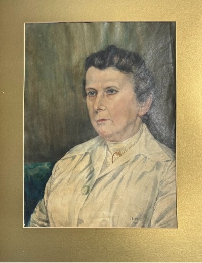 An original 1921 gouache and watercolour portrait painting of a woman in a cream blouse set against a muted green background.