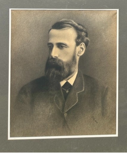 A framed late 19th-century charcoal portrait depicting a bearded gentleman in formal attire. View II