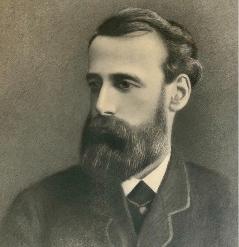 A framed late 19th-century charcoal portrait depicting a bearded gentleman in formal attire. View VII