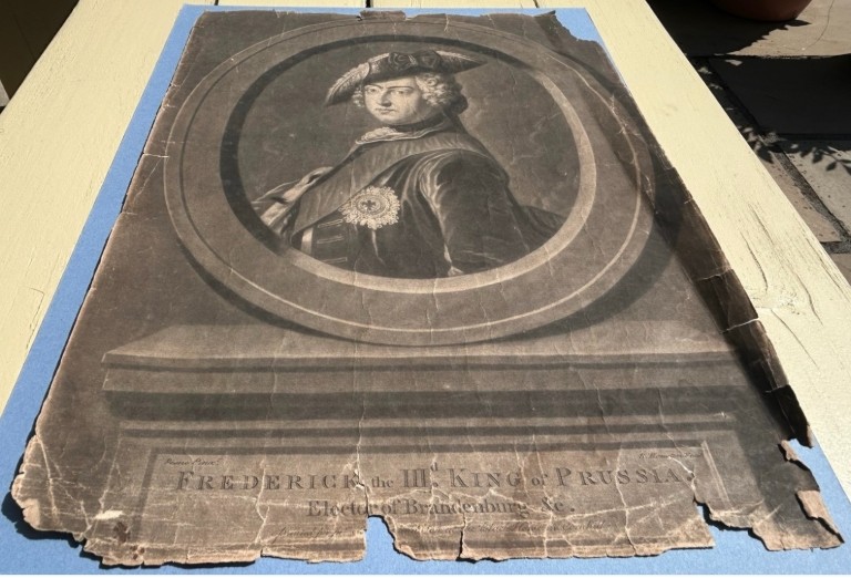 An 18th-century monochrome mezzotint print depicting a bust portrait of Frederick King of Prussia set within a stone oval frame. View VIII