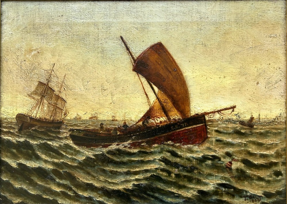 A late 19th-century oil painting on canvas portraying a fishing trawler with brown sails navigating choppy dark green sea waters, presented in a light coloured frame. View XV