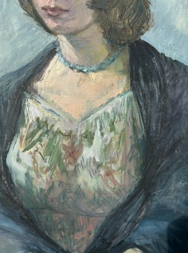 A mid-century oil painting on canvas depicting a seated woman wearing a patterned dress, blue necklace, and dark shawl, framed in a grey wooden frame. View VII