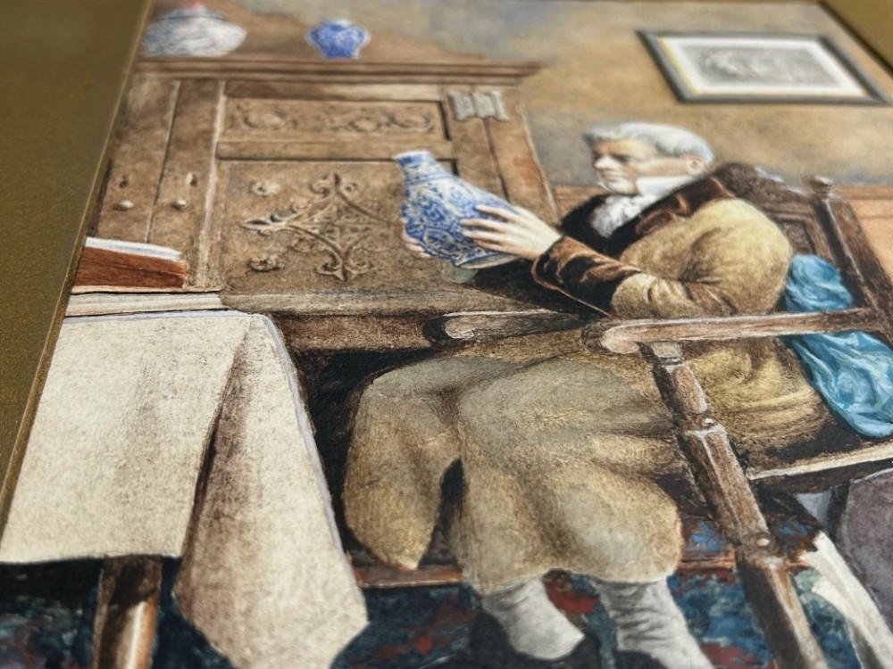 A late 19th-century watercolour painting depicting an elderly gentleman seated in a carved oak chair, examining a blue and white porcelain vase inside a wood-panelled room. View VII