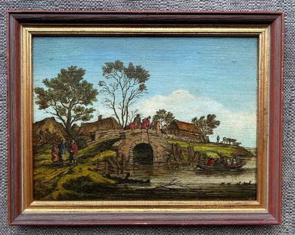 A pair of framed 19th-century oil paintings on wood panels depicting rural Flemish landscapes with stone bridges, rivers, thatched cottages, and pastoral figures. View II