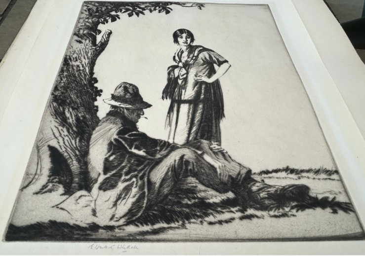 A monochrome drypoint etching depicting a seated man in a hat and a standing woman beneath a leafy tree trunk. View X