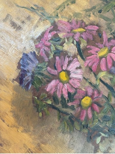 A mid-20th century oil painting on board featuring pink and purple flowers in a yellow pitcher against a textured ochre background, presented in a wooden frame. View X