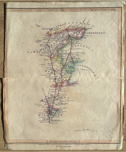 An 1821 engraved British road map featuring hand-coloured county outlines detailing travel routes from London to Stamford.