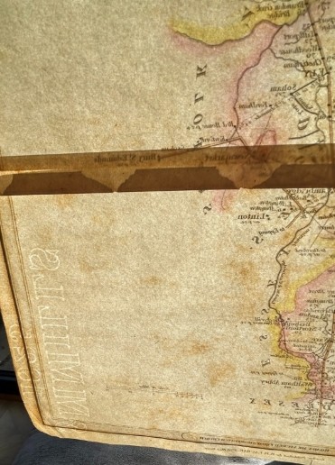 A hand-coloured Georgian engraved road map showing routes through Cambridgeshire and Norfolk printed on cream paper. View VI