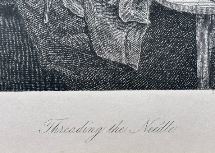 A monochrome nineteenth-century steel engraving depicting an elderly woman wearing spectacles and a headscarf threading a needle while seated at a small wooden table. View V